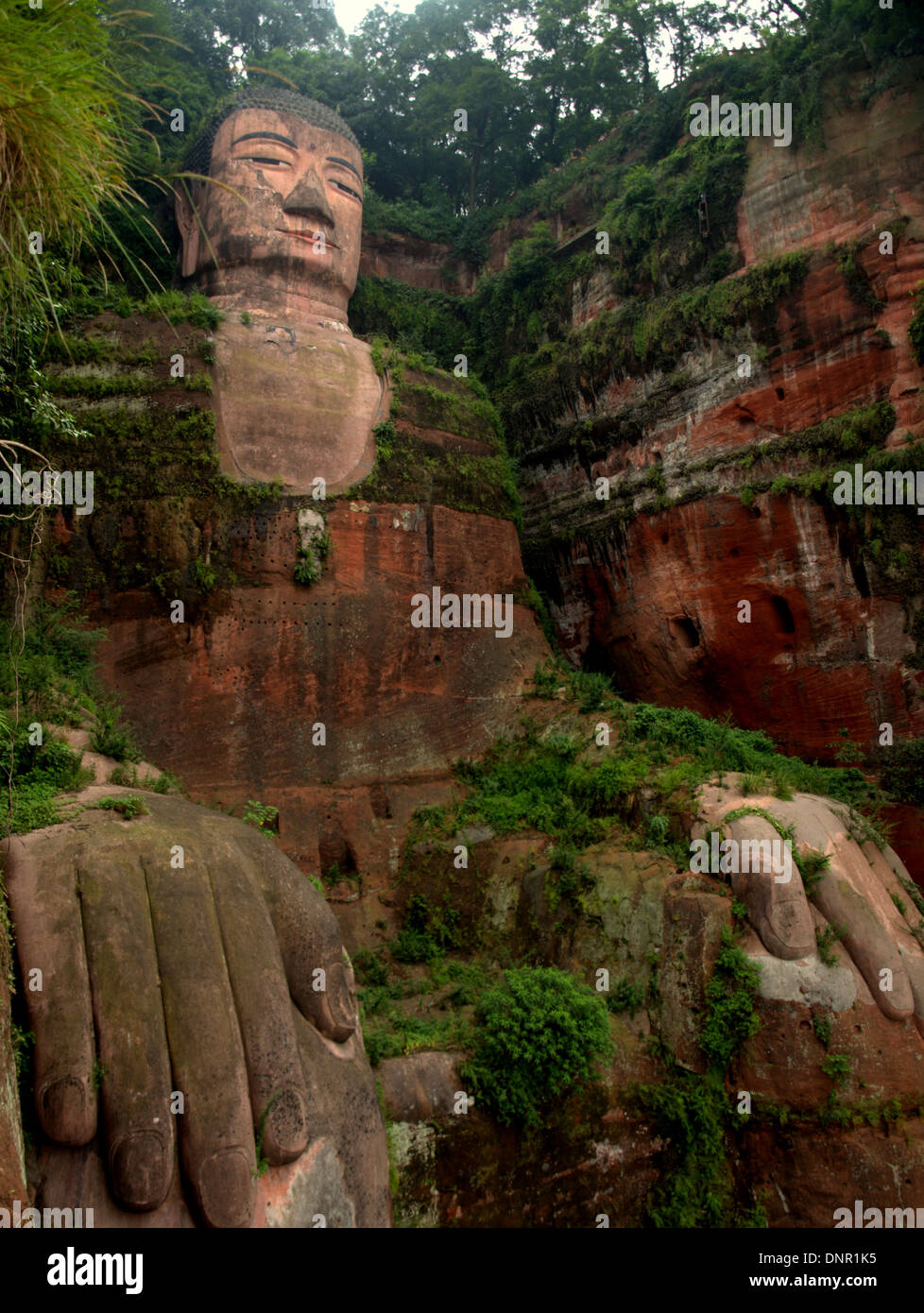 The Leshan Giant Buddha, a 233-foot tall stone statue, built during the Tang Dynasty in Sichuan, China, near Leshan. Stock Photo