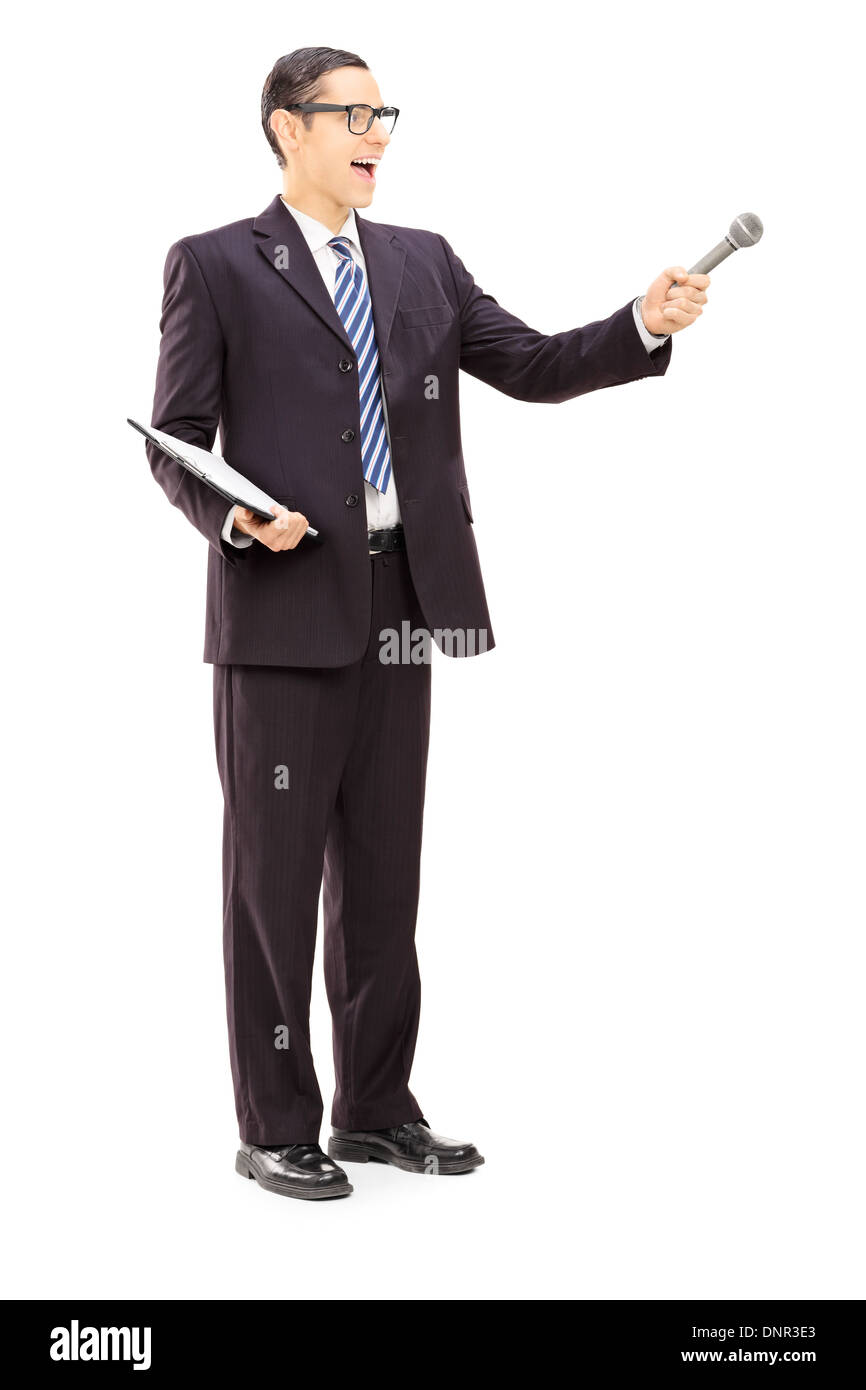 Full length portrait of a survey conductor holding clipboard and microphone Stock Photo