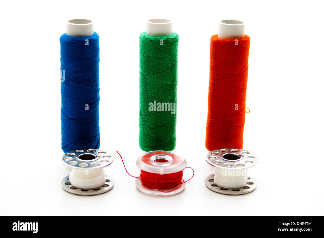 Coloured sewing cotton roles Stock Photo - Alamy