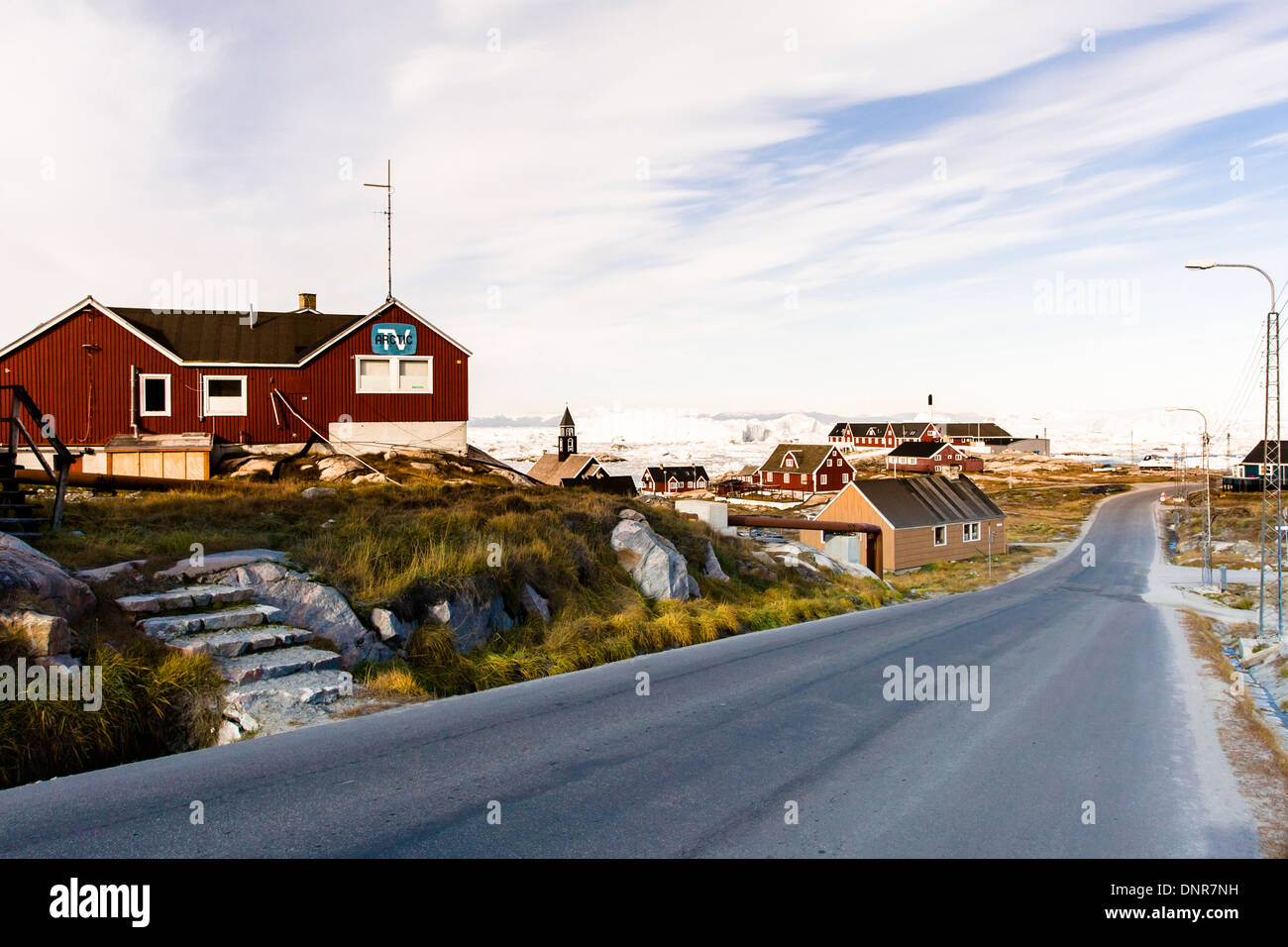 Arctic TV building overlooking empty road in Ilulissat (Jakobshavn), Greenland Stock Photo