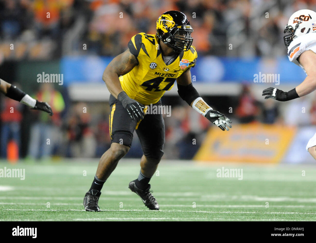 Arlington, TX, USA. 03rd Jan, 2014. Missouri Tigers defensive lineman Kony Ealy #47 during the 78th Annual AT&T Cotton Bowl Classic bowl game between the Oklahoma State University Cowboys and the Missouri Tigers at AT&T Stadium in Arlington, TX Missouri defeated Oklahoma State 41-31 Credit:  Cal Sport Media/Alamy Live News Stock Photo