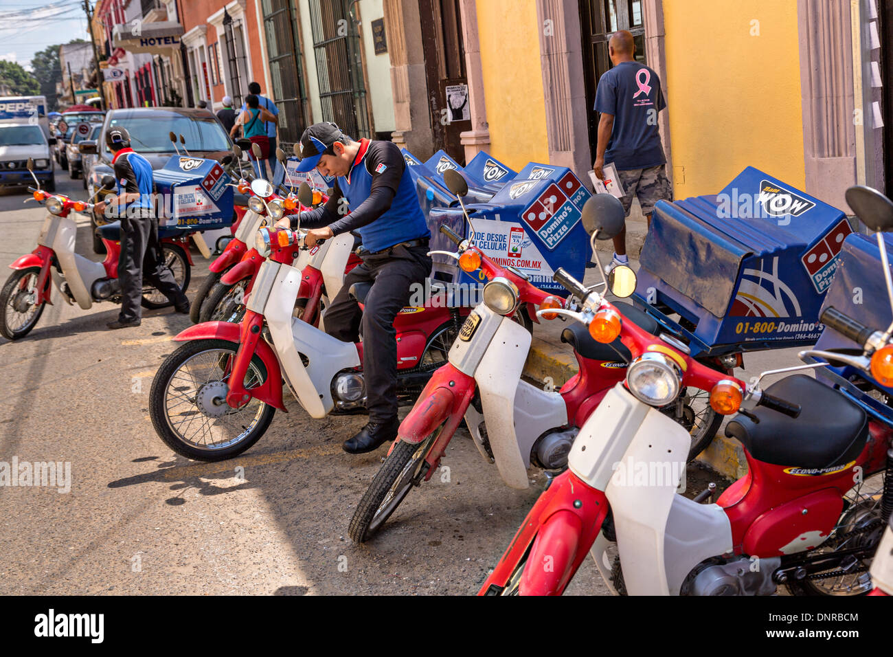 Scooters deliver oaxaca mexico men hires stock photography and images