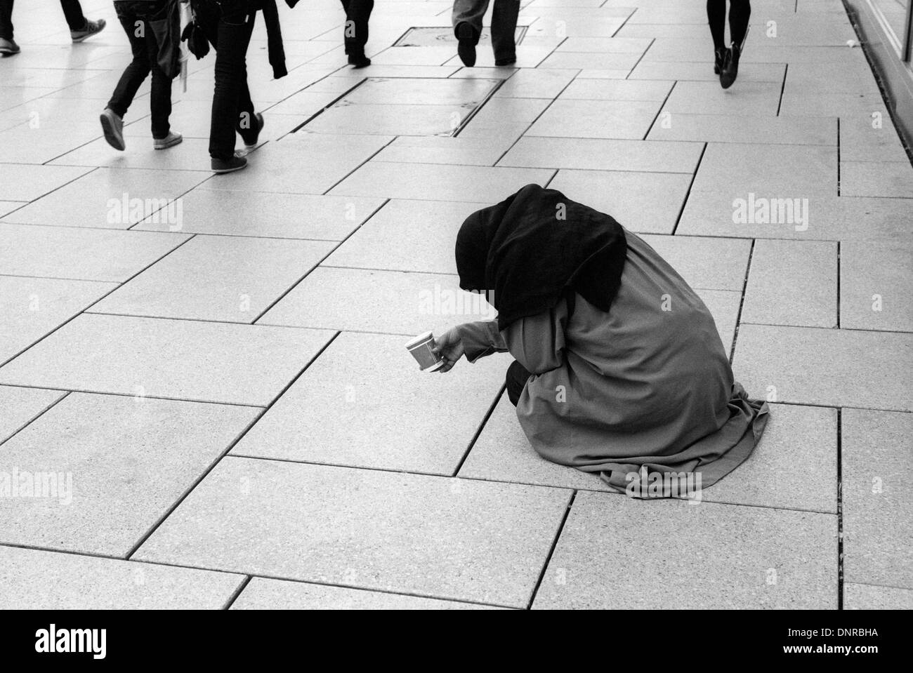 Woman begging Frankfurt am Main Hessen Germany Stock Photo