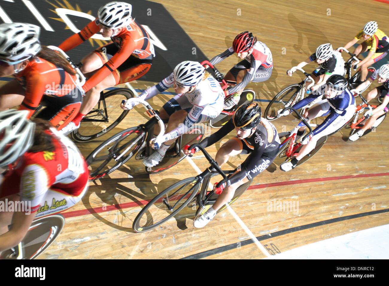 Manchester, UK. 4th January 2014. Revolution Series Track Cycling Round 3. Riders in the women's elimination race (Elinor Barker centre bottom) Credit:  Neville Styles/Alamy Live News Stock Photo