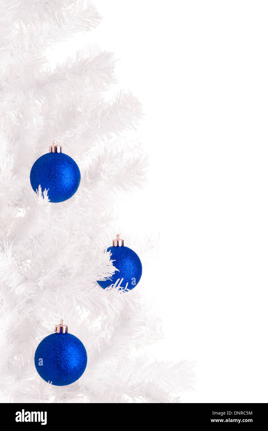 White Christmas tree and blue balls, white background Stock Photo - Alamy