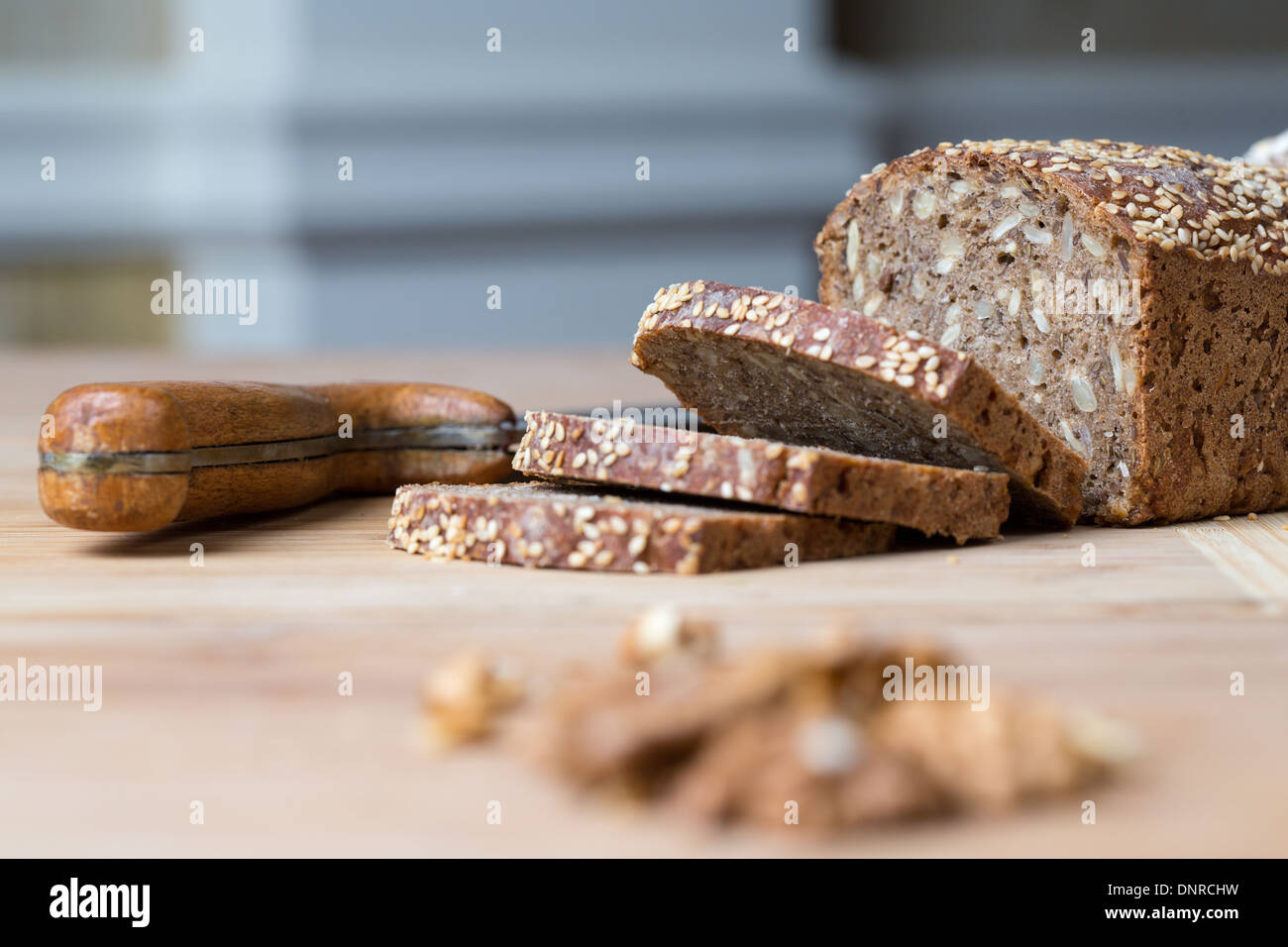 Sliced loaf of wheat bread with sunflower seeds Stock Photo