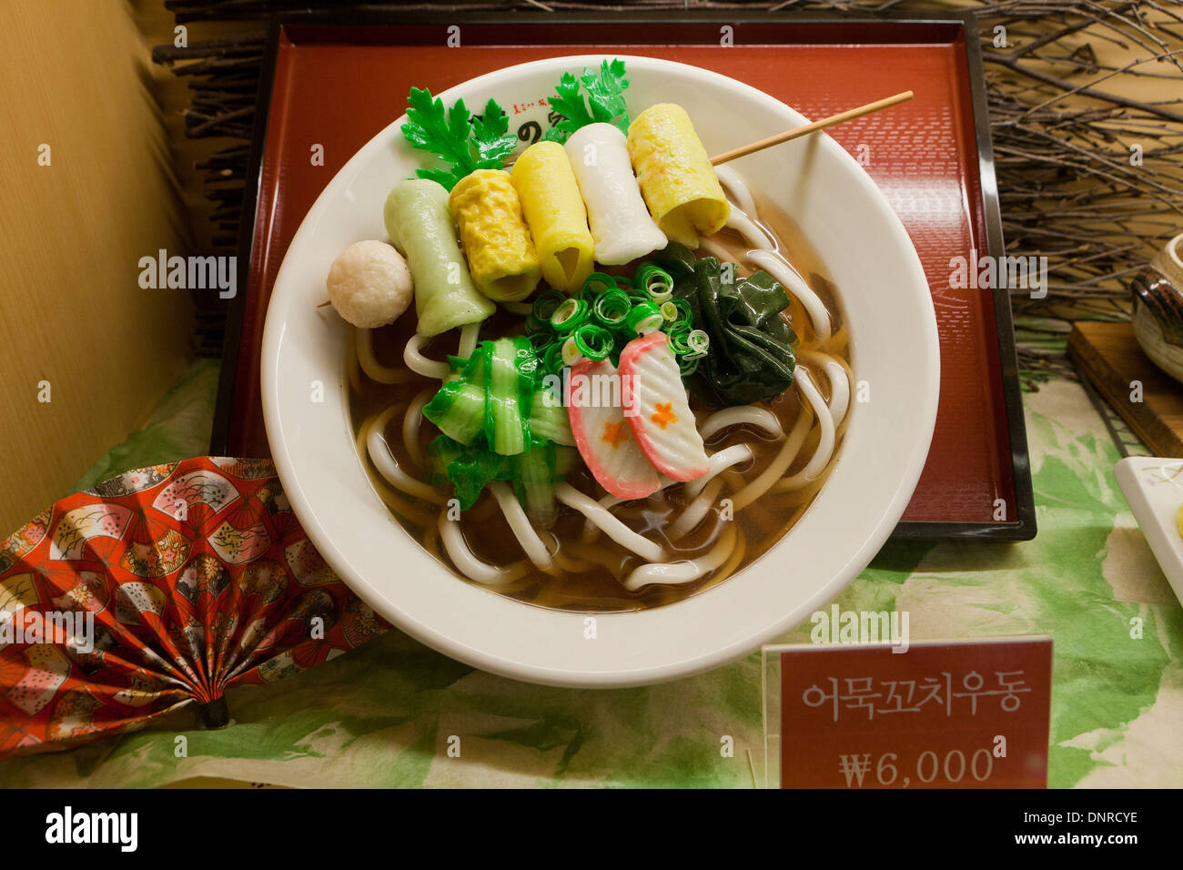 Plastic food model (udon noodles) display case at fast food restaurant - Seoul, South Korea Stock Photo