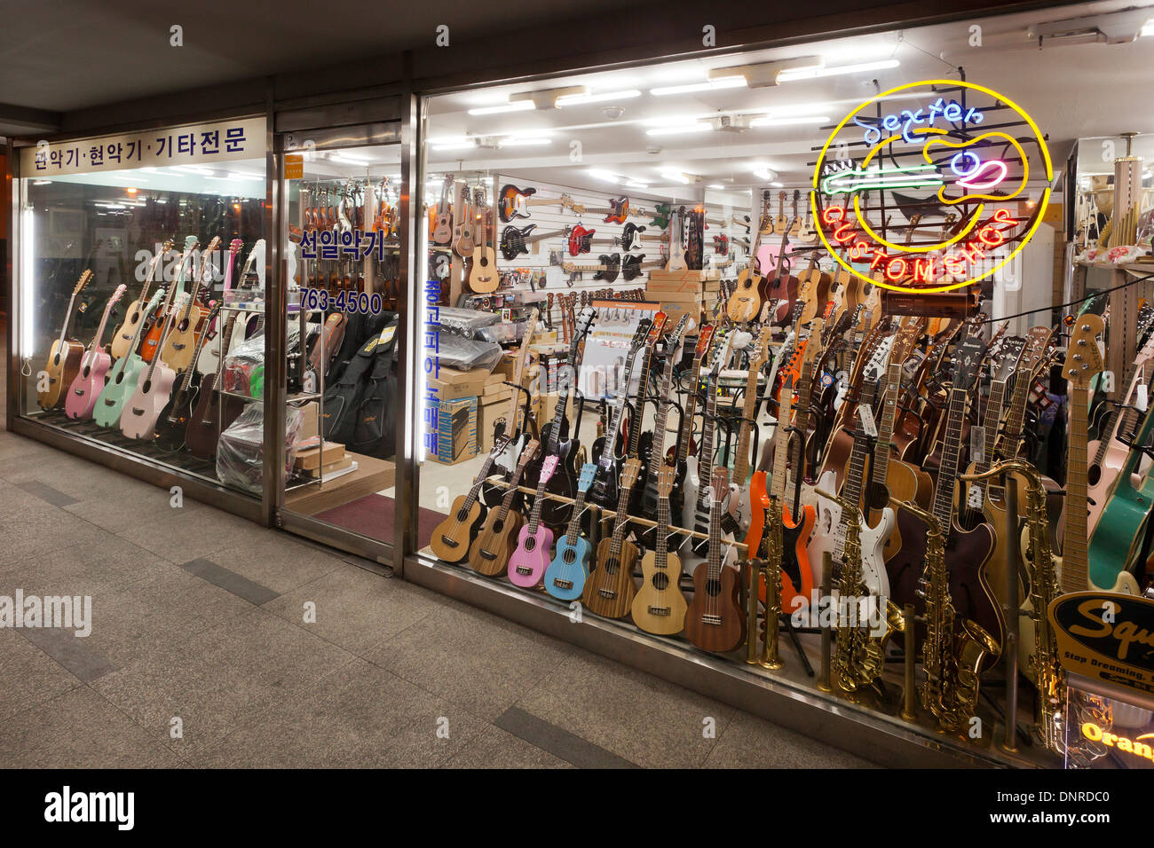 Various models of guitars on display at music store - Seoul, South Korea Stock Photo