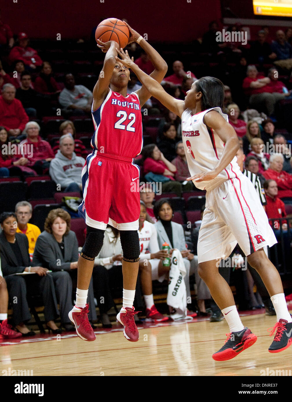 Piscataway, New Jersey, USA. 4th Jan, 2014. Houston's forward Marche' Amerson (22) shoots over Rutgers' guard Tyler Scaife (3) in the first half during American Athletic Conference basketball action between the Rutgers Scarlet Knights and the Houston Cougars at the Louis Brown Athletic Center (The RAC) in Piscataway, New Jersey. © csm/Alamy Live News Stock Photo