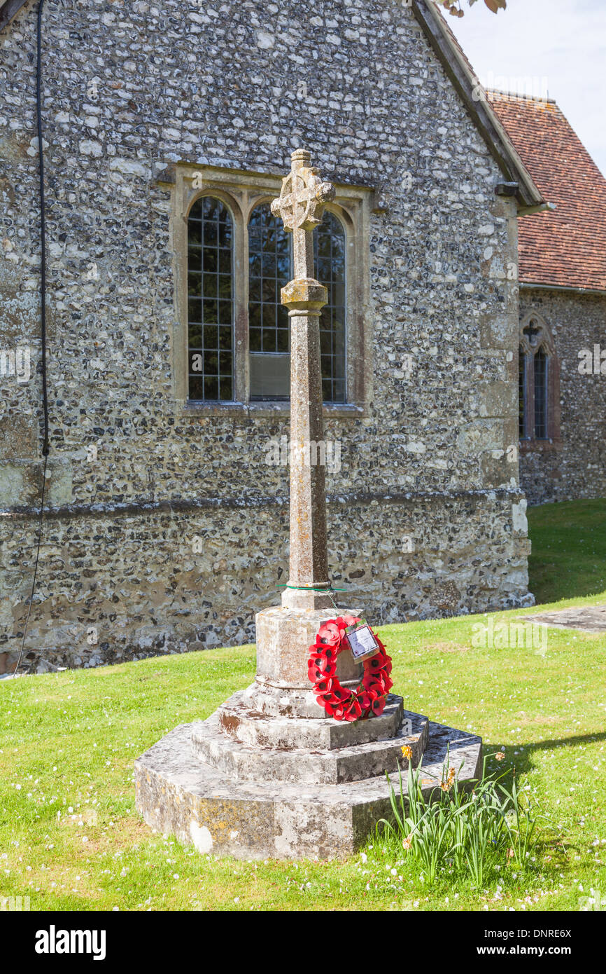 High Roding War Memorial Ww1 remembrance cross with red poppy hi-res stock photography and ...