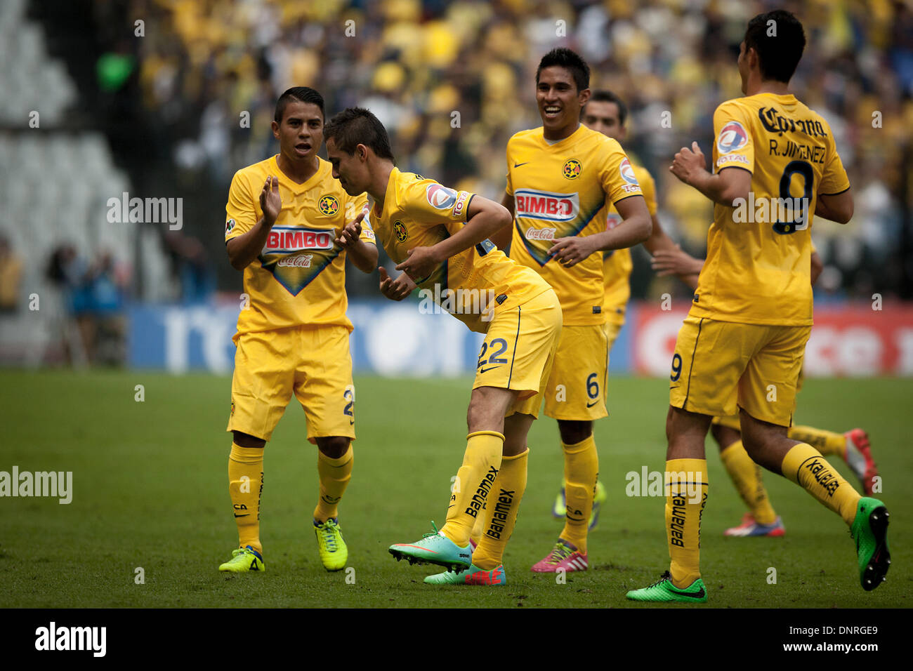Mexico City, Mexico. 4th Jan, 2014. Paul Aguilar (2nd L) of America celebrates for a goal during the match against Tigres at the MX League Closing Tournament 2014, held in the Azteca Stadium, in Mexico City, capital of Mexico, on Jan. 4, 2014. Credit:  Pedro Mera/Xinhua/Alamy Live News Stock Photo