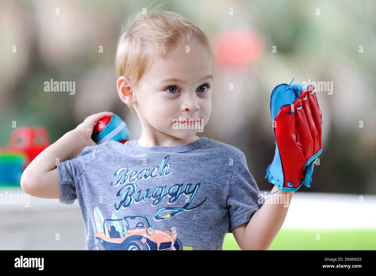 Young boy playing baseball Stock Photo