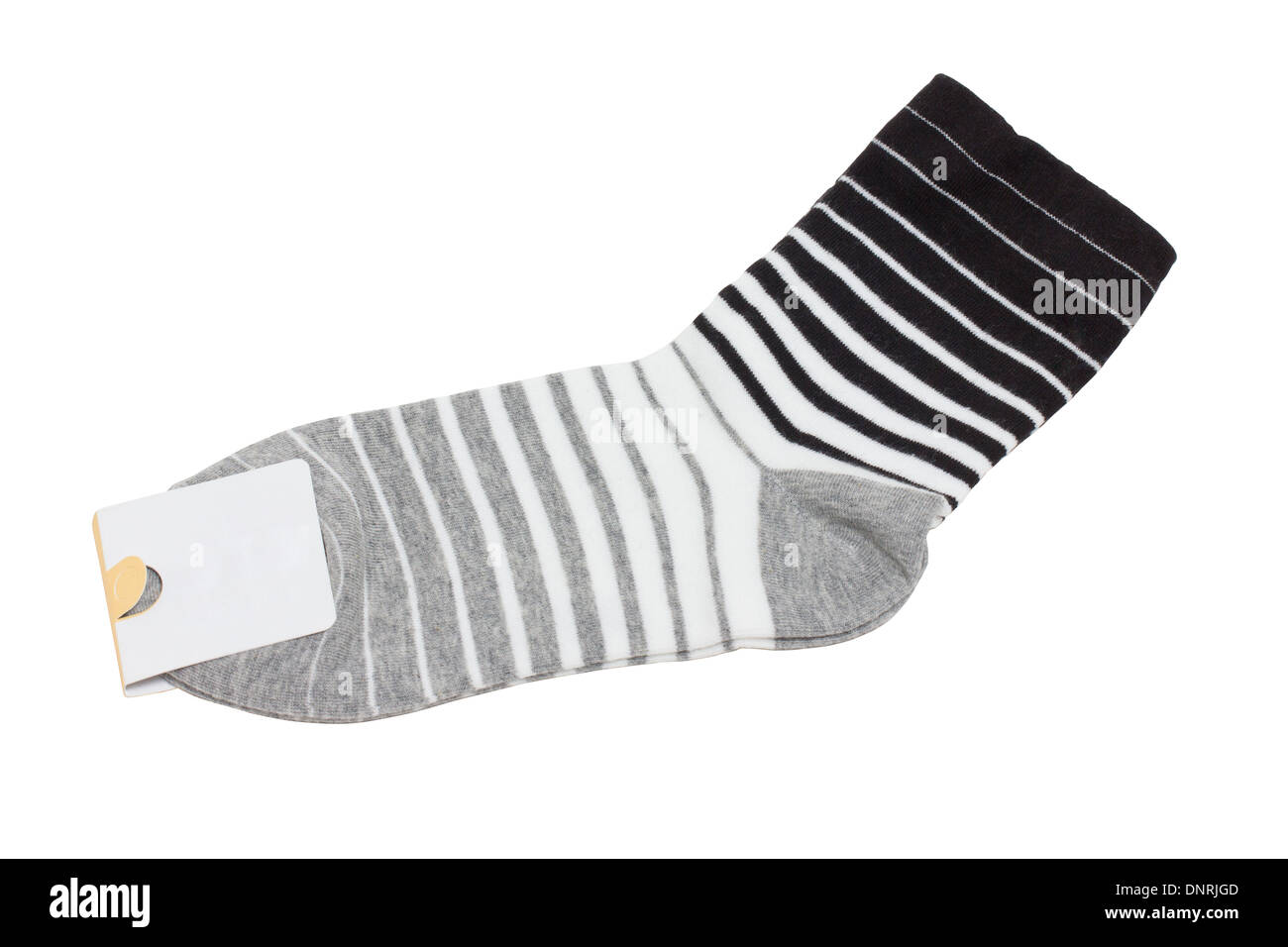 New socks with label isolated on white. Stock Photo