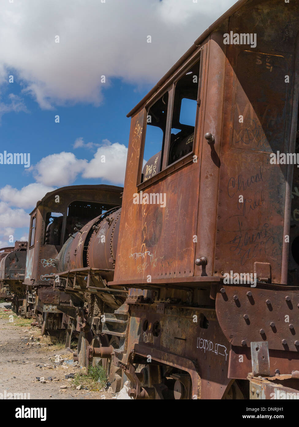 Bolivian train cemetery consisting of old steam locomotives and antique trains abandoned in Salar de Uyuni, Bolivia. Stock Photo