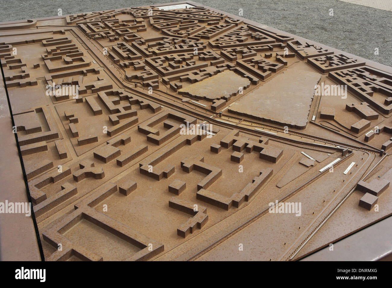 Outdoor metal plan Berlin Wall border zone and buildings in 1989, Bernauer Strasse at Gartenstrasse towards Mauer Park, Germany Stock Photo