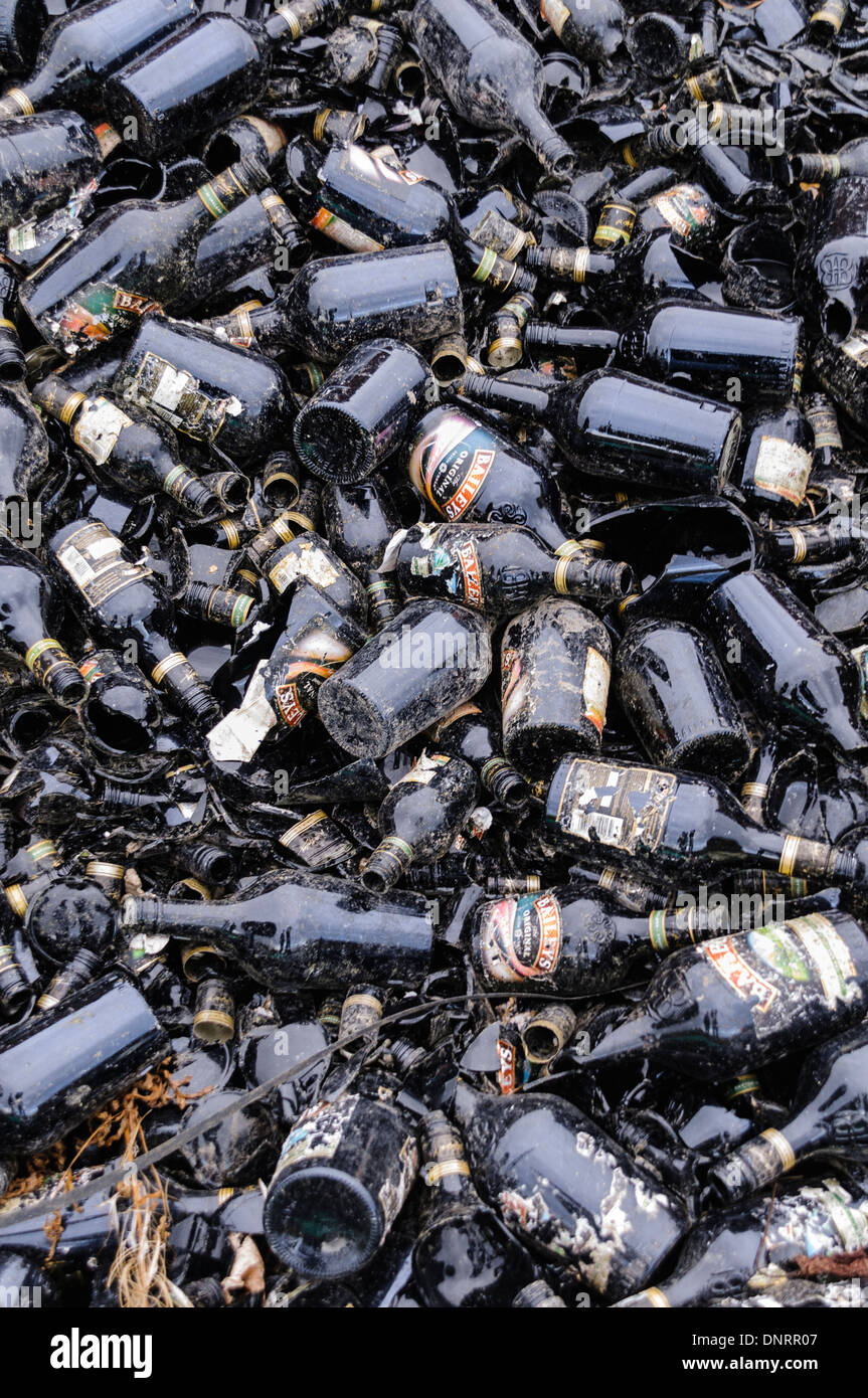 Pile of empty Baileys bottles at a recycling centre Stock Photo