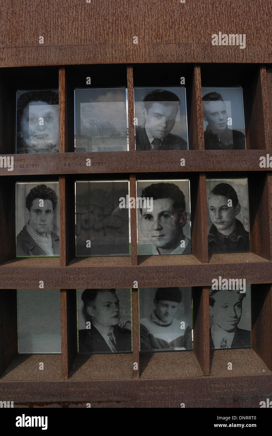 Sunny view three rows monochrome photographs 12 Berlin Wall victims