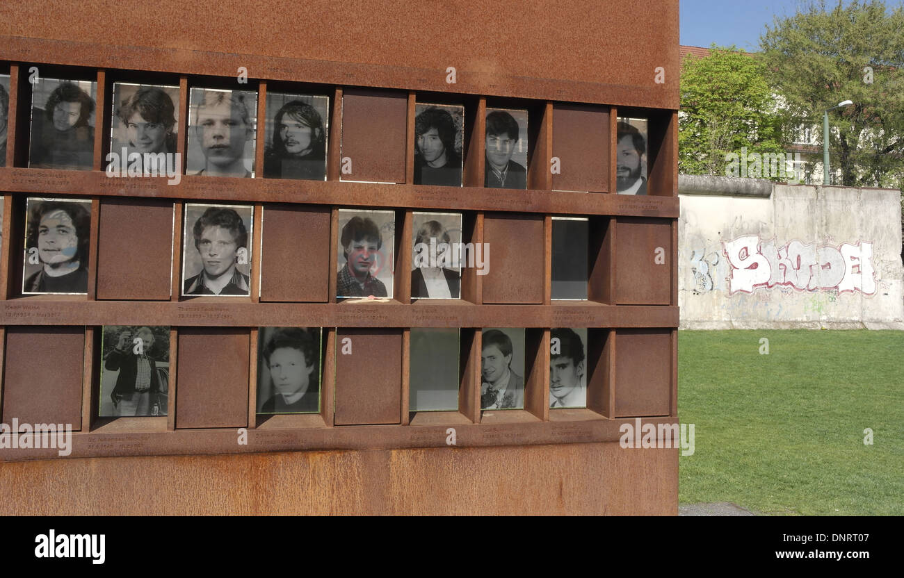 Sunny view monochrome photographs of 17 Berlin Wall victims, killed