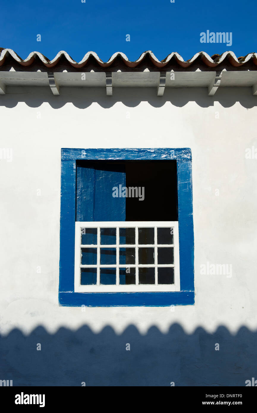 Brazilian colonial architecture simple open window blue frame on white ...