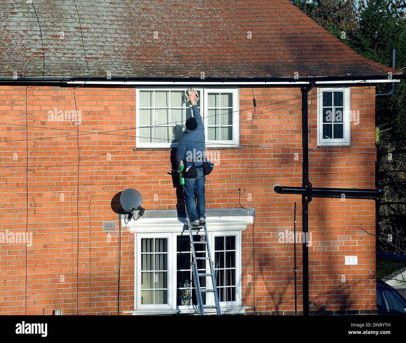 Premium Photo  Man washing and cleaning window at home housework