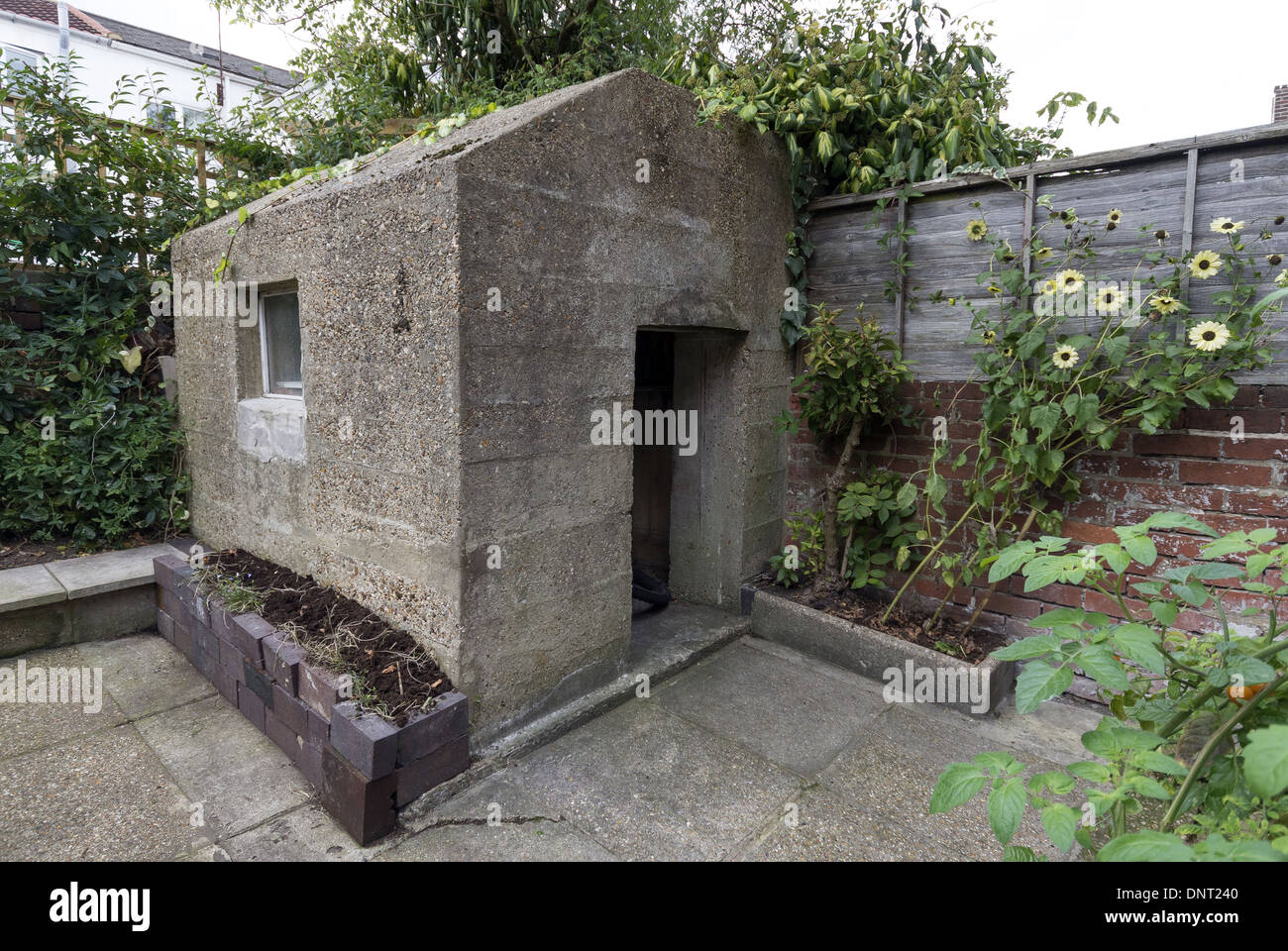 Thick concrete air raid shelter in the back garden of a Southampton home in Hampshire, England Stock Photo