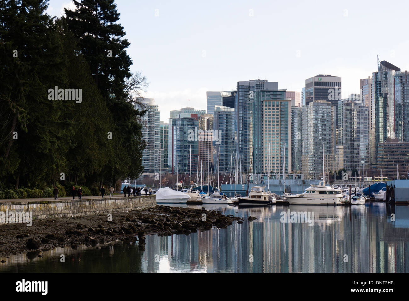 People walking along seawall. Stanley Park & Coal Harbour, Vancouver, British Columbia, Canada. Stock Photo