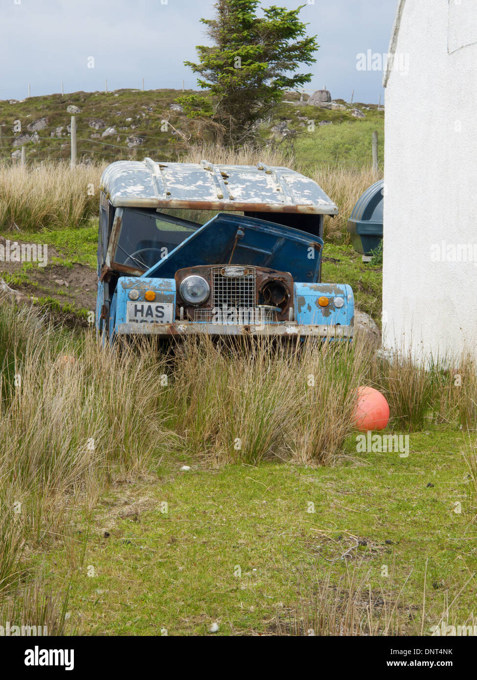 Cottage with derelict Land Rover in garden, near Redpoint, Loch