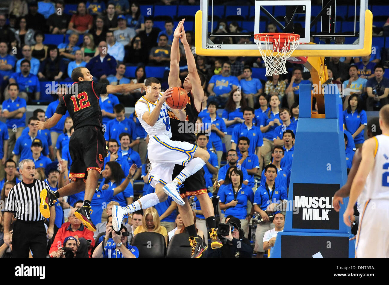 Los Angeles, CA, USA. 5th Jan, 2014. UCLA Bruins guard Zach LaVine #14 moves the ball in the first half during the College Basketball game between the USC Trojans and the UCLA Bruins at Pauley Pavilion in Los Angeles, California.Louis Lopez/CSM/Alamy Live News Stock Photo