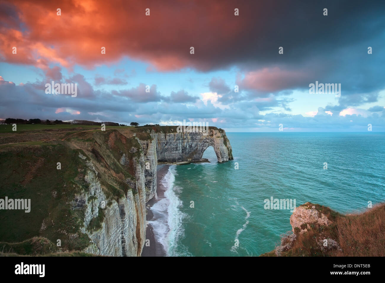 Sunrise over the cliff of etretat in normandy hi-res stock photography ...