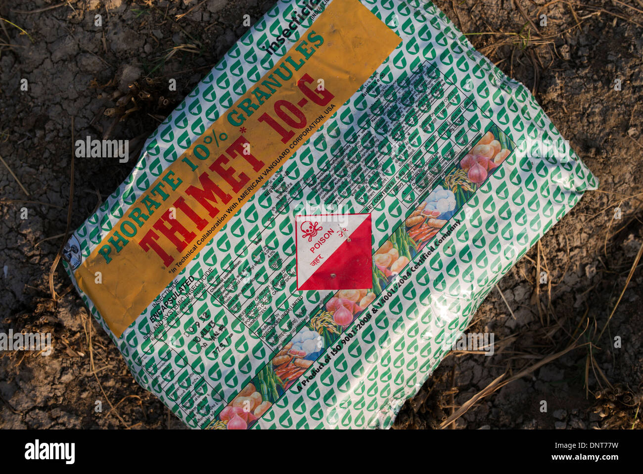Empty packet of Thimet Insecticide discarded in the Indian countryside. Andhra Pradesh, India Stock Photo