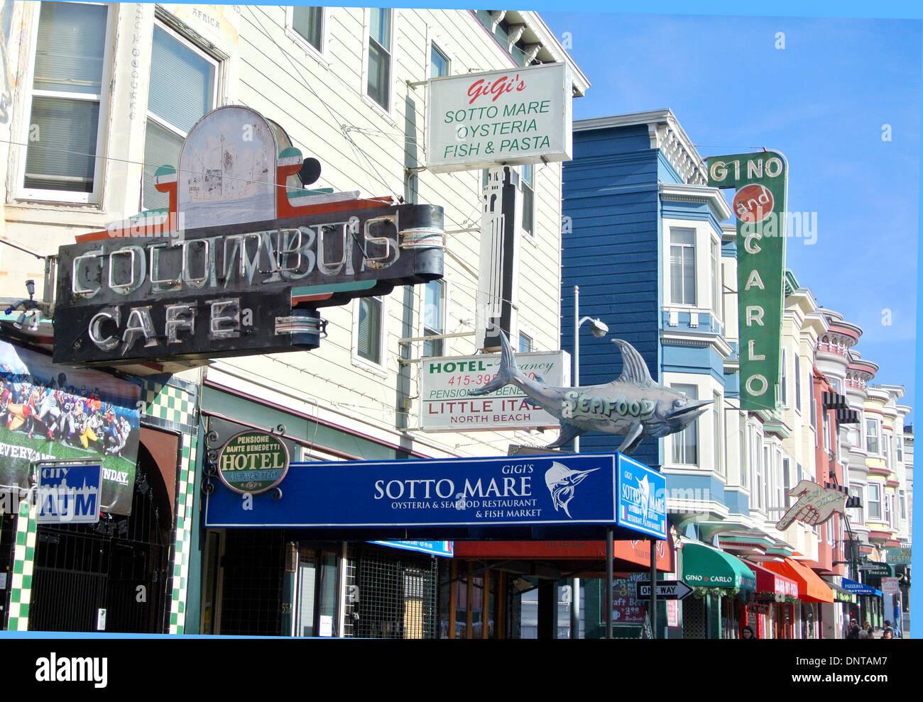view of neon signs on Filbert Street in North Beach San Francisco Stock Photo