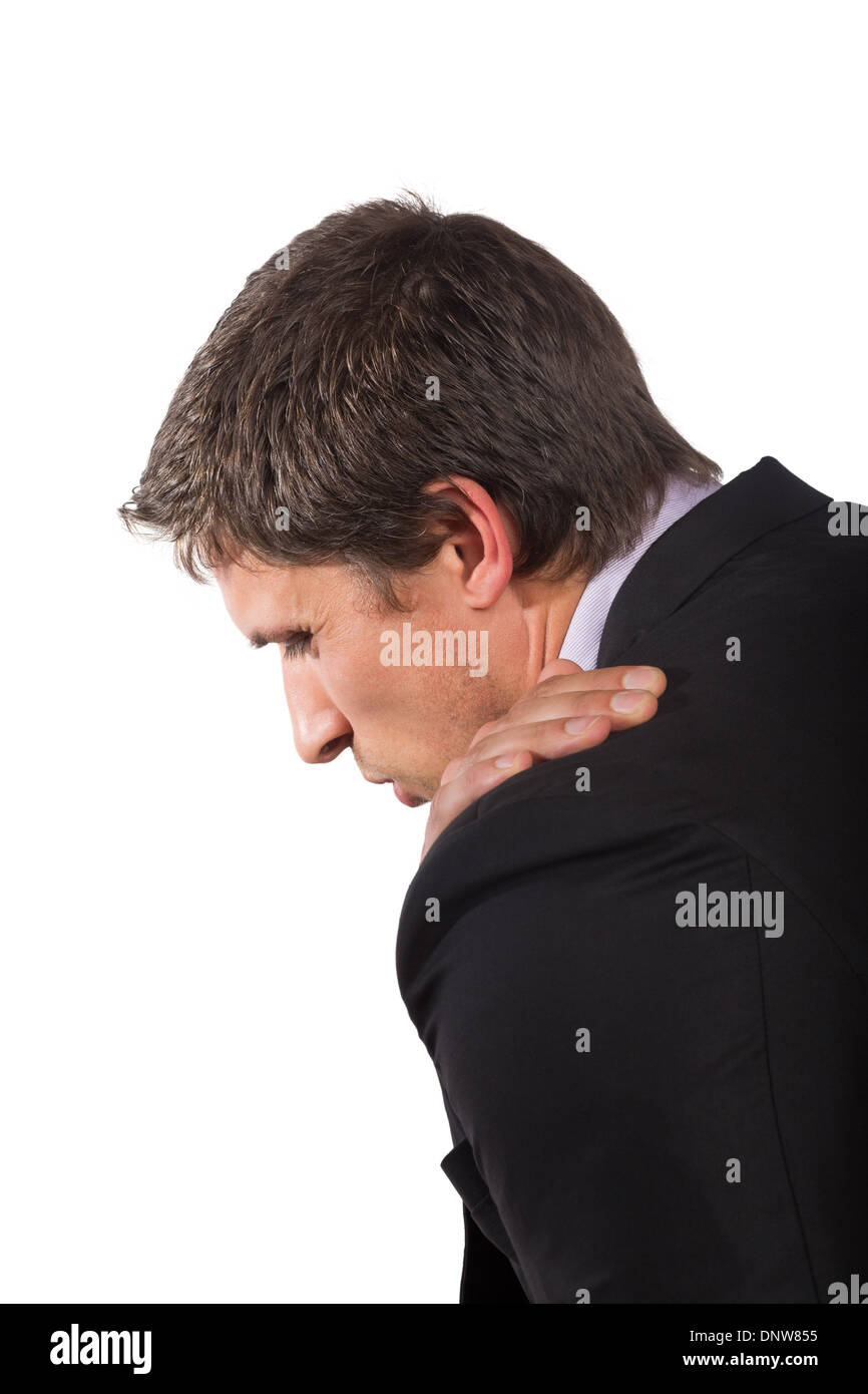 Businessman suffering from shoulder pain Stock Photo