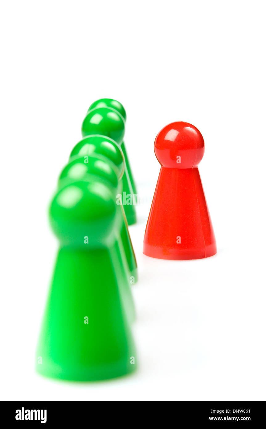green plastic counters with one red Stock Photo