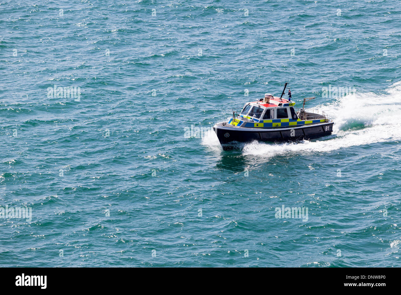 screening and inspection. Police launch patrolling harbour. Gibraltar ...
