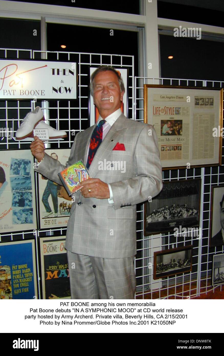 Feb. 15, 2001 - PAT BOONE among his own memorabilia.Pat Boone debuts ''IN A SYMPHONIC MOOD'' at CD world release .party hosted by Army Archerd. Private villa, Beverly Hills, CA 2/15/2001 .  Nina Prommer/   2001 K21050NP.(Credit Image: © Globe Photos/ZUMAPRESS.com) Stock Photo