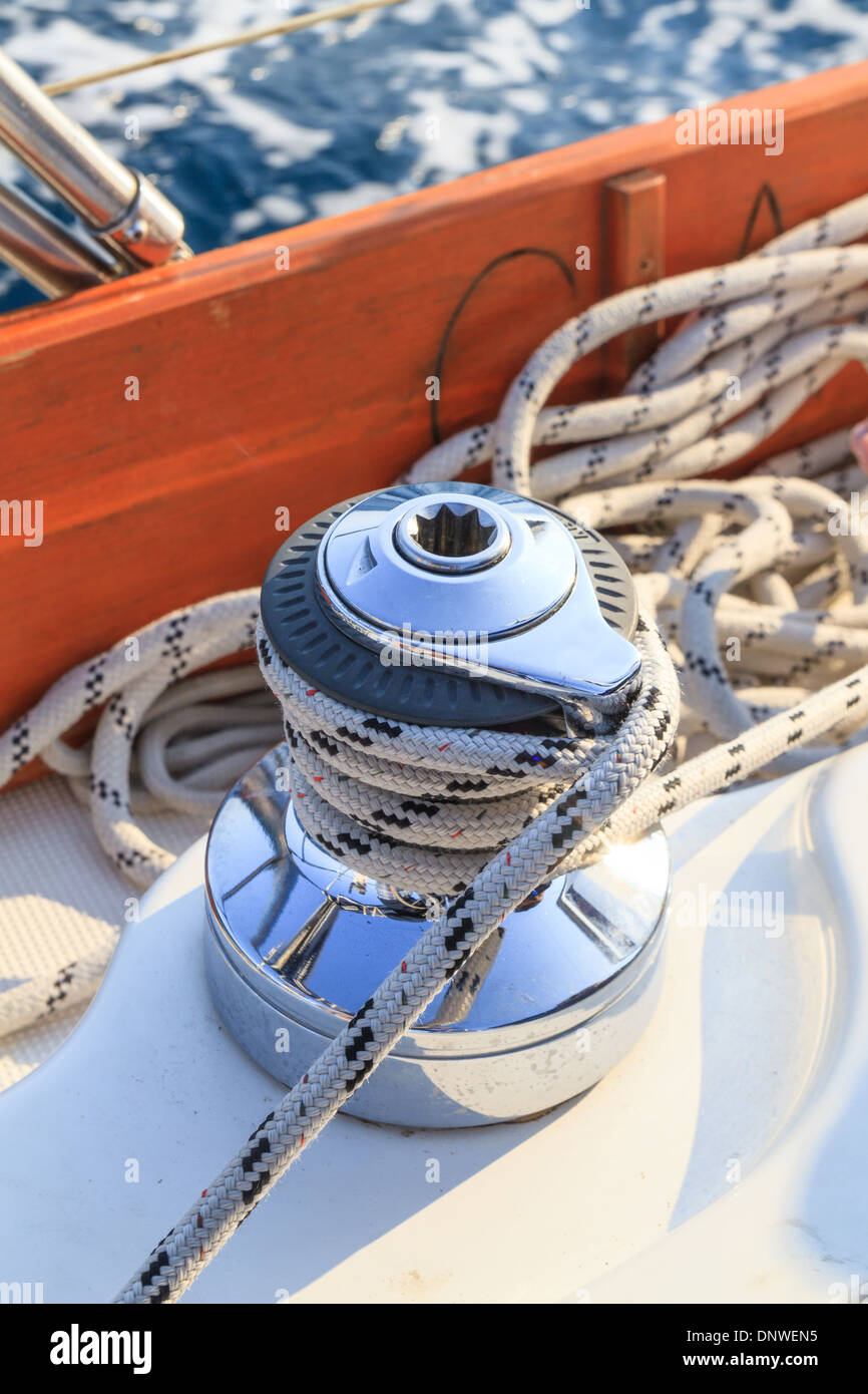 Sailboat winch and rope detail on yacht Stock Photo
