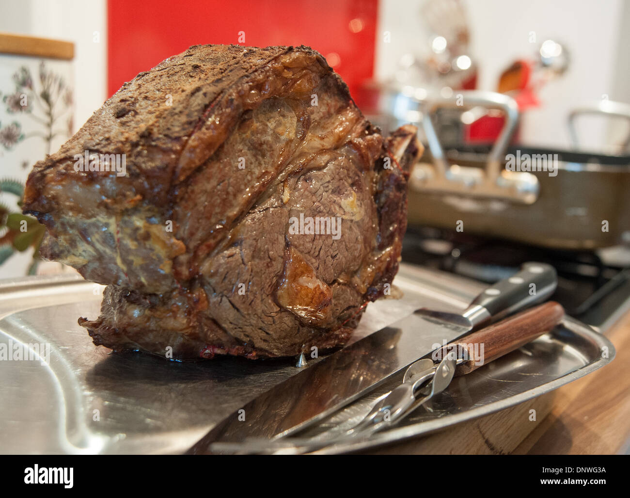 Cooked Rib of Beef joint for Sunday roast lunch in roasting tray and