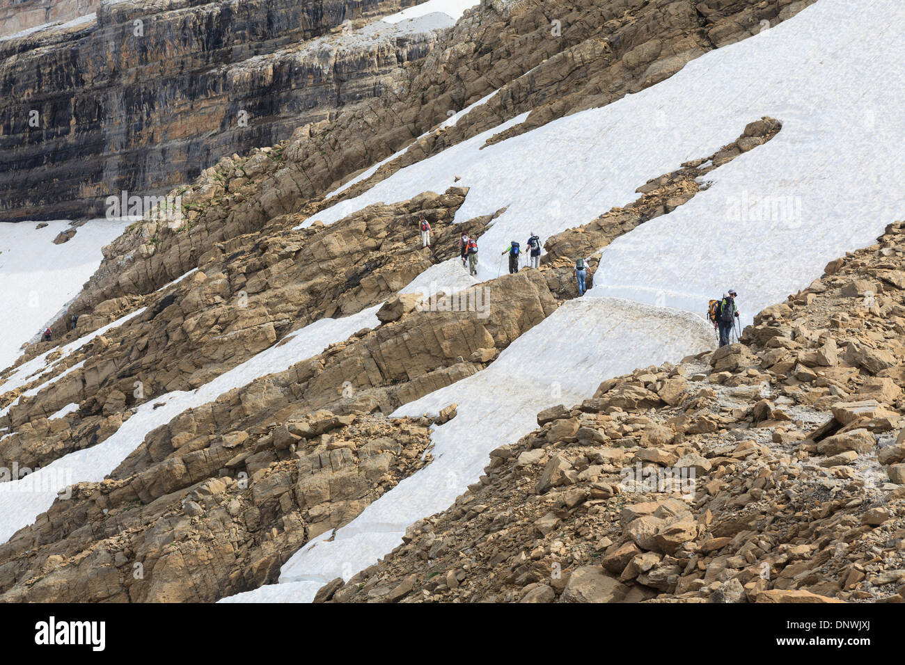 Hikers on their way to Refuge des Sarradets. Cirque de Gavarnie. Pyrenees National Park. France. Stock Photo