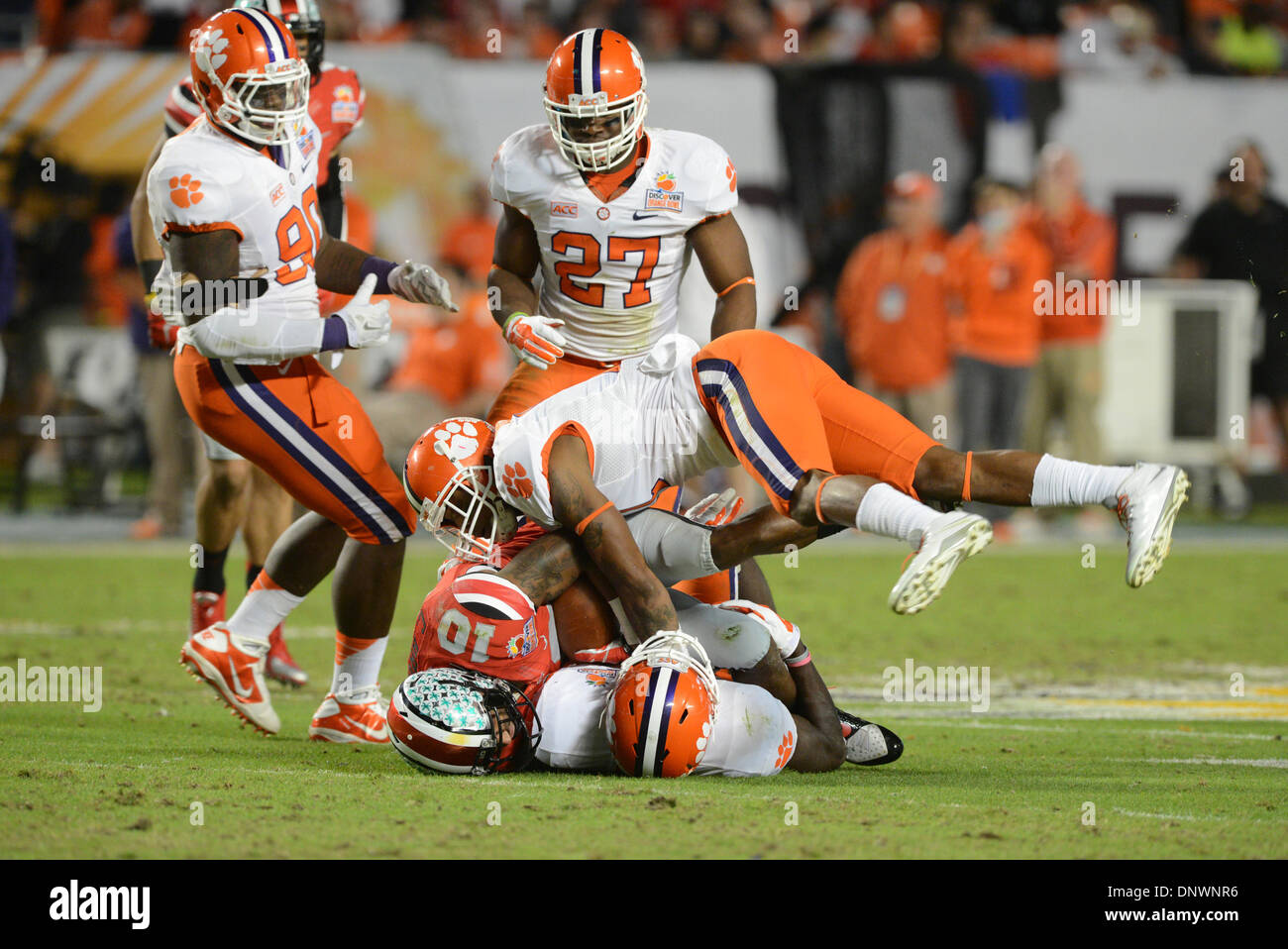 January 3 14 Jayron Kearse And Bashaud Breeland 17 Of Clemson Tackle Corey Brown 10 Of Ohio State During The Ncaa Football Game Between The Clemson Tigers And The Ohio State