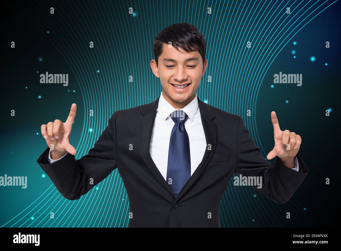 Composite image of smiling businessman holding Stock Photo - Alamy