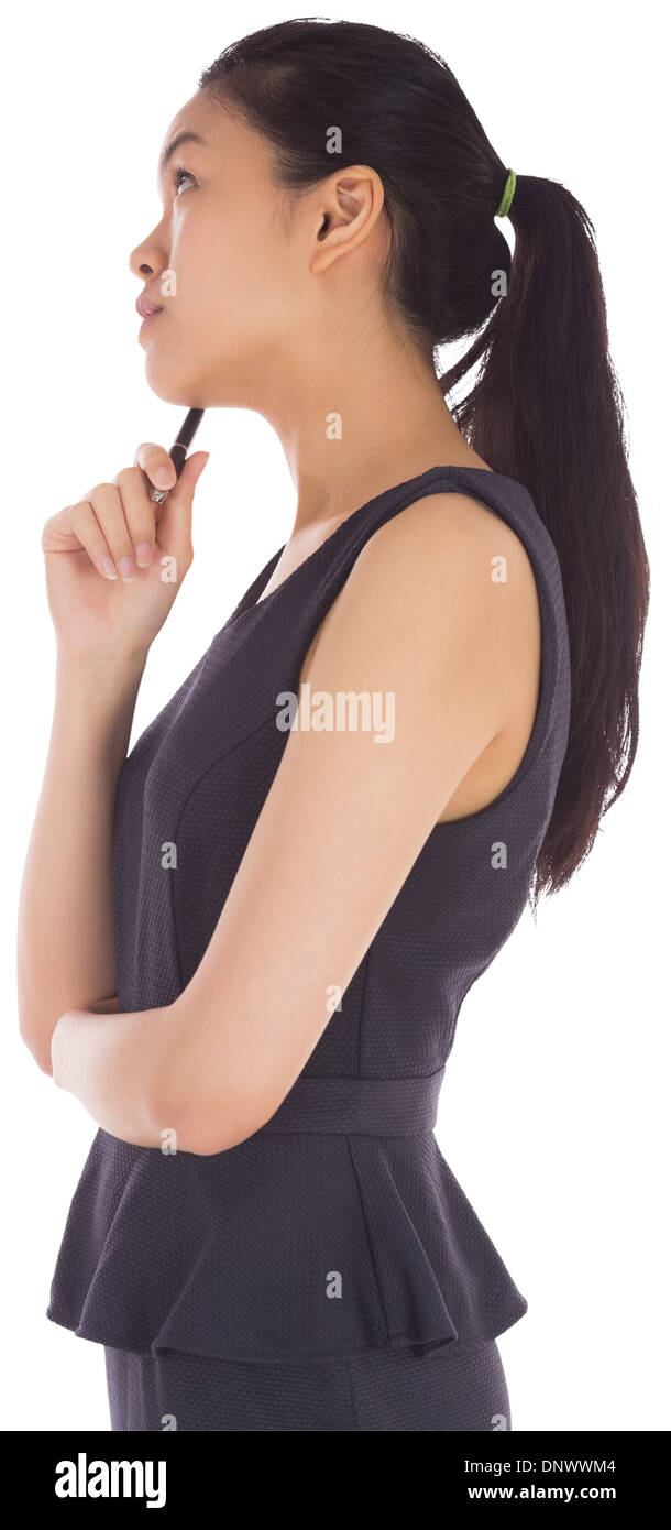 Focused thoughtful young asian hi-res stock photography and images - Alamy