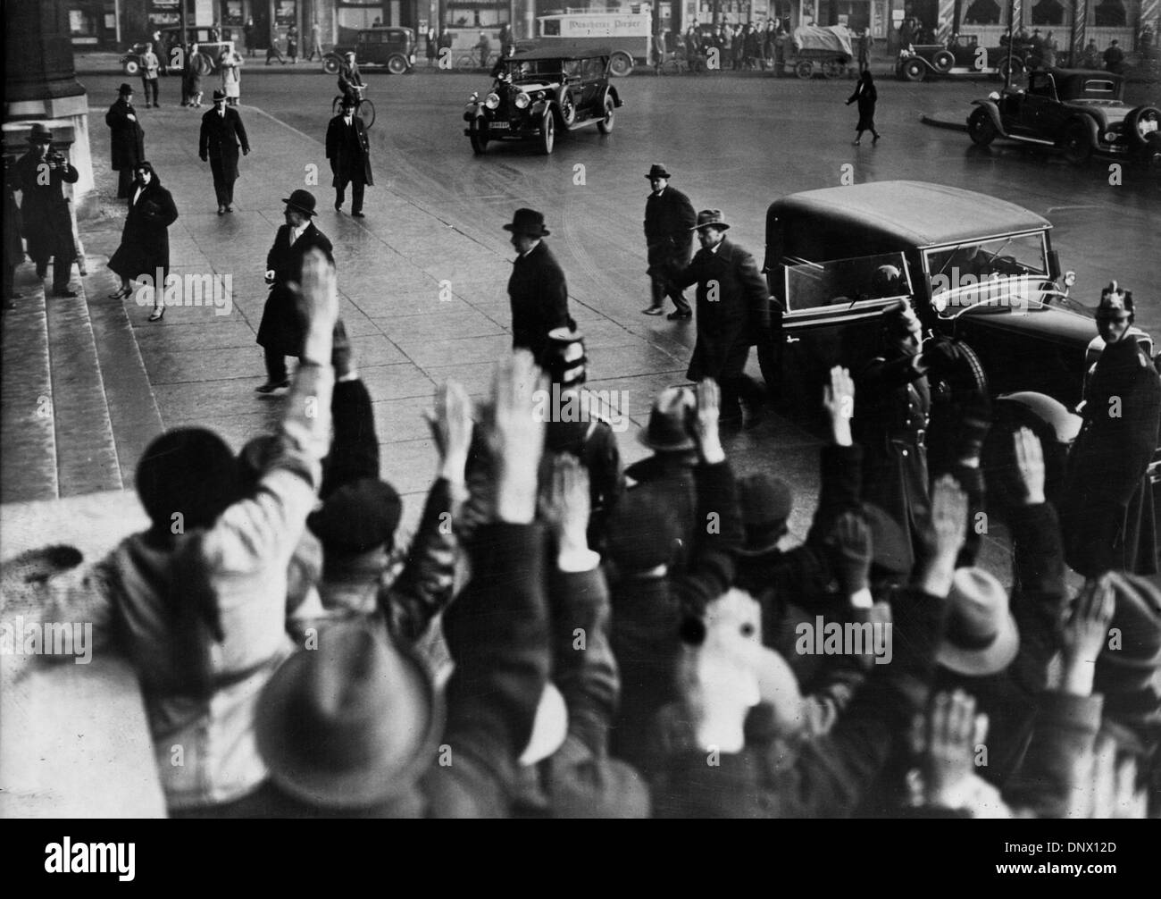 July 7, 1923 - Berlin, Germany - Nazi leader and Fuhrer of Germany, ADOLF HITLER is saluted by a group of people as he arrives at the Palace of Justice in Berlin. (Credit Image: © KEYSTONE Pictures/ZUMAPRESS.com) Stock Photo