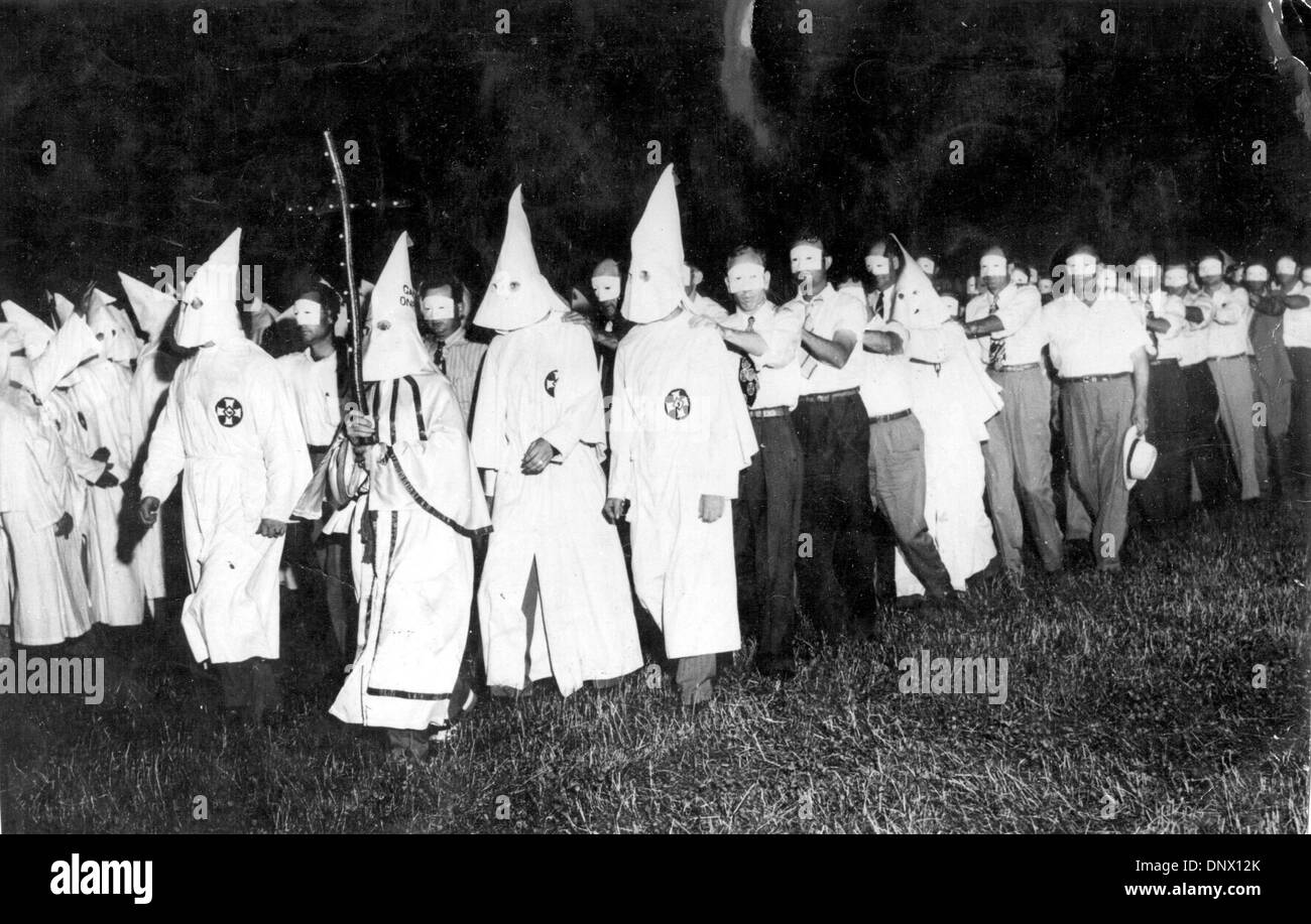 Jan. 1, 1925 - Atlanta, GA, U.S. - Advocating white supremacy and acting as vigilantes while hidden behind conic masks and white robes, Ku Klux Klan (KKK) is the name of several past and present secret organizations in the United States, mostly in the South. The first KKK arose in the turmoil after the Civil War. It utilized terrorism, violence, and lynching to intimidate and oppre Stock Photo