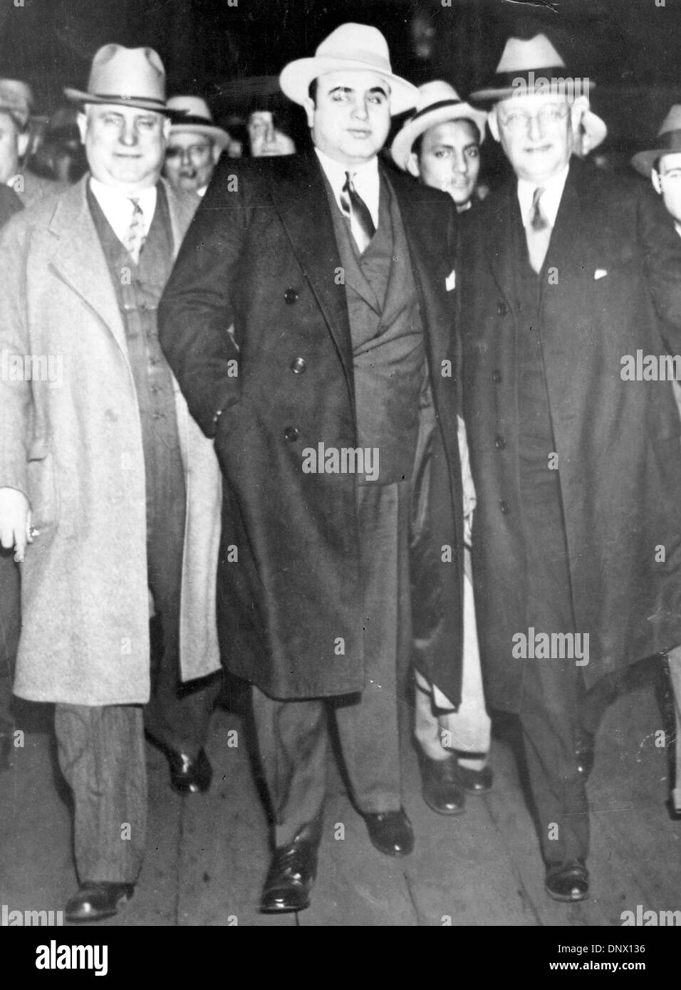 May 14, 1929 - New York, NY, U.S. - AL CAPONE (C) with MARSHALL LAUBENHEIMER (R) in New York. Al Capone is America's best known gangster and the single greatest symbol of the collapse of law and order in the United States during the 1920s Prohibition era. Capone had a leading role in the illegal activities that lent Chicago its reputation as a lawless city.  (Credit Image: © KEYSTO Stock Photo
