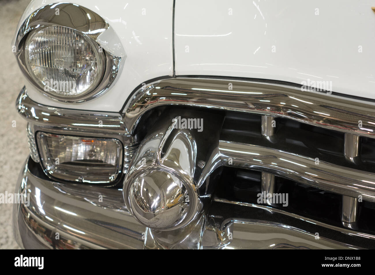 Front end details from a 1952 white Cadillac Convertible  in display at Technik and Auto Museum Sinsheim Germany Stock Photo