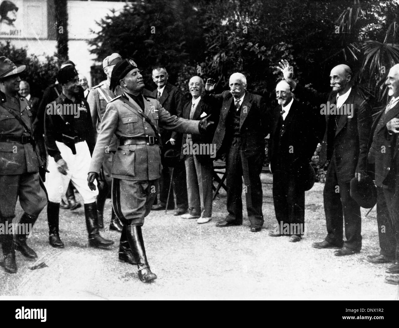 Jan. 10, 1933 - Rome, Italy - BENITO MUSSOLINI (1883-1945) the Italian dictator and leader of the Fascist movement being greeted by a group of elderly men. (Credit Image: © KEYSTONE Pictures USA/ZUMAPRESS.com) Stock Photo