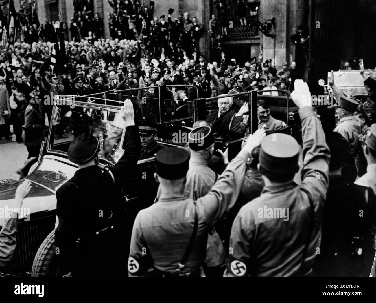 May 1, 1933 - Berlin, Germany - German Reich President PAUL VON HINDENBURG  and Nazi leader ADOLF HITLER are saluted by a crowd during the celebrations  of the May Day in Germany. (