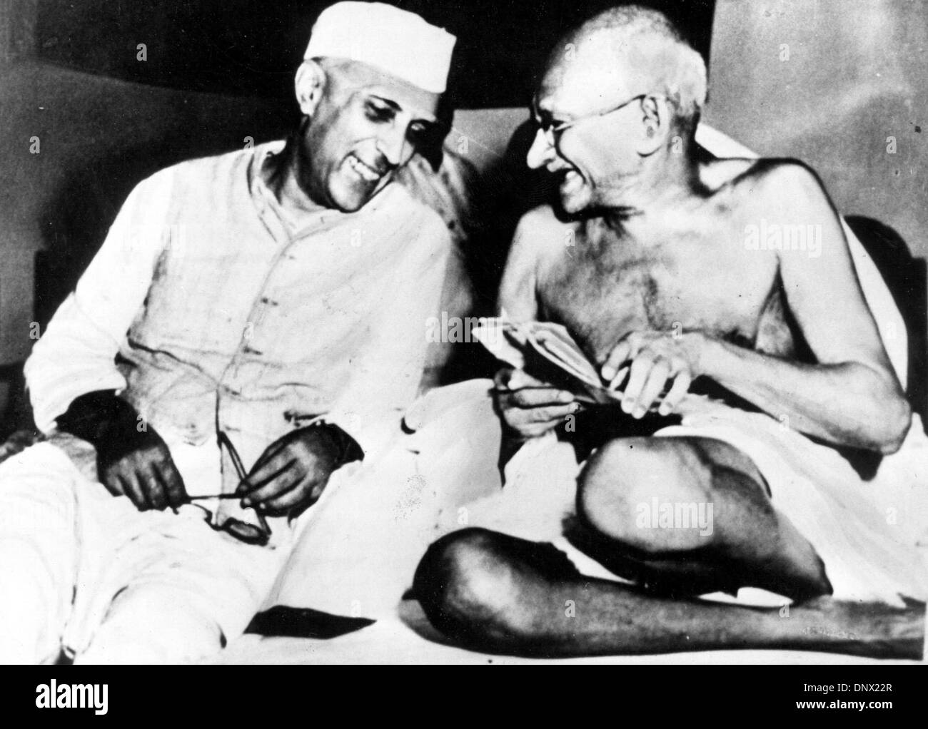 Jan. 1, 1940 - Delhi, India - A major political and spiritual leader of India and the Indian independence movement MAHATMA GANDHI (right) and his comrade-in-arms JAWAHARLAL NEHRU. GANDHI, recognized in India as the Father of the Nation, was the pioneer of Satyagraha-the resistance of tyranny through mass civil disobedience, firmly founded upon ahimsa or total non-violence-which led Stock Photo