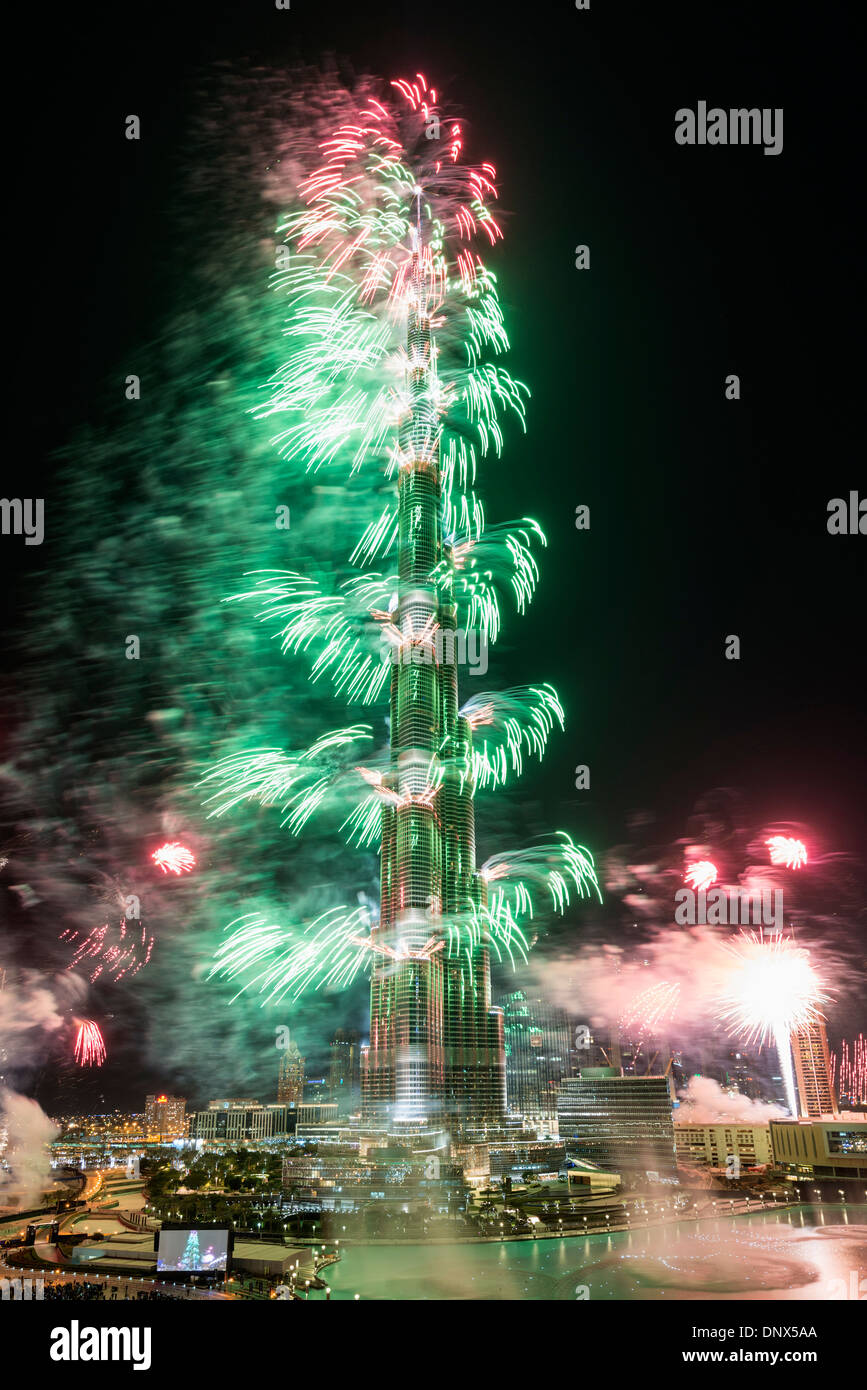 Fireworks at Burj Khalifa Tower at midnight on December 31st 2013 to celebrate New Year 2014 in Dubai United Arab Emirates Stock Photo