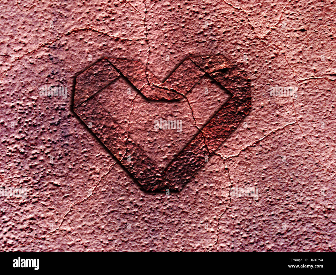 Grunge heart embossed on rusty metal surface - Valentine concept Stock Photo